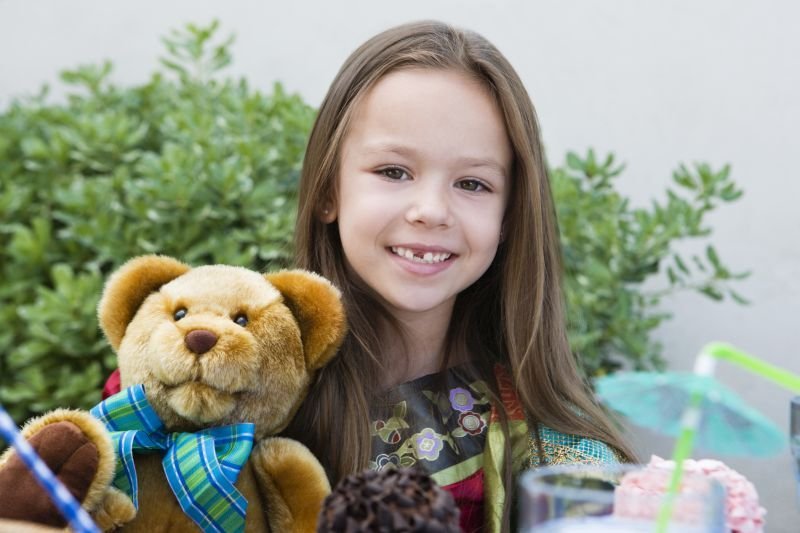 Girl with Teddy Bear