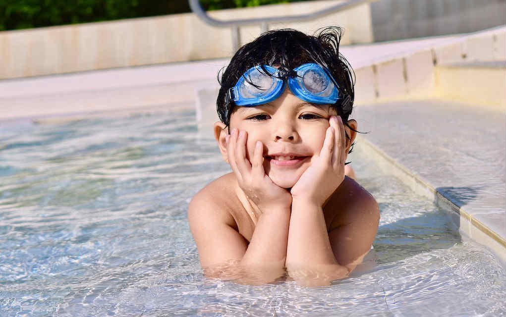 Boy outdoor swimming