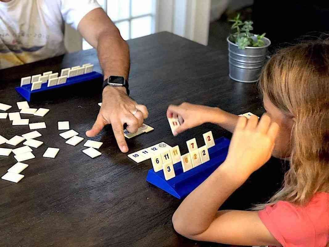 Parent-and-child-playing-rummikub