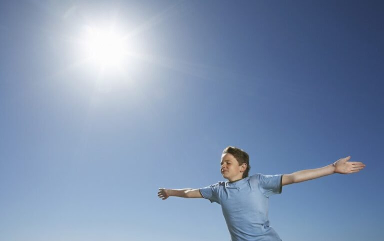 Measure solar energy fun science facts science experiments for kids to try at home boy standing in sun