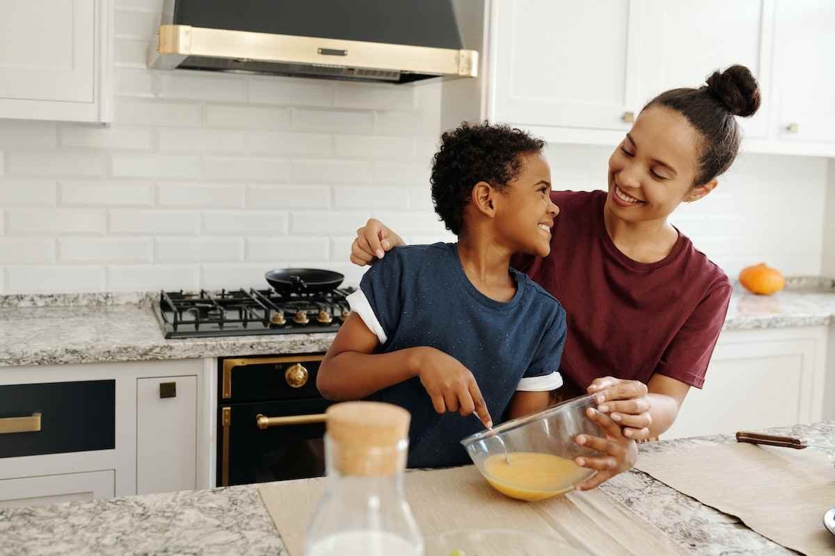 child cooking (1) ways to save money this summer