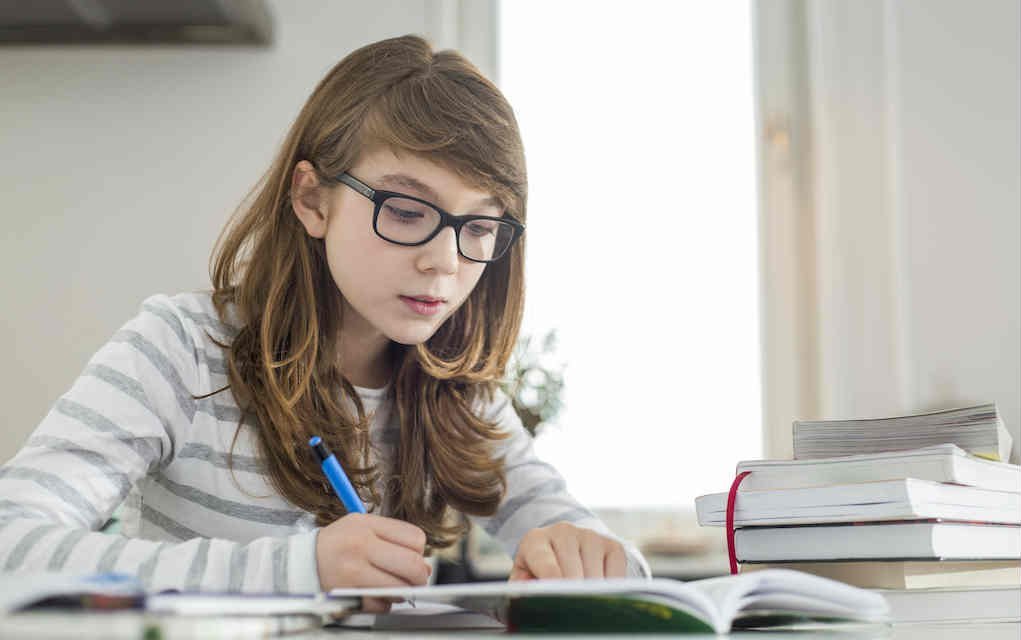 Teenager studying for Parenting teens - Mykidstime